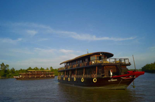 Vietnam - Croisière sur le Mékong - Les bateaux Bassac dans le Delta © Morgan Ommer - Digital Mekong